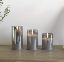 Festive Lights - 3 Pack of Grey LED Real Wax Candles in Smoked Glass Cylinder - Authentic Flickering Flame on Realistic Black Wick - Battery Operated with Time (With Remote)